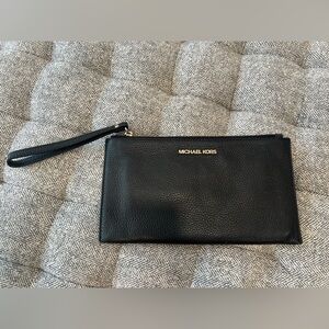 Michael Kors large black leather wristlet- like new
